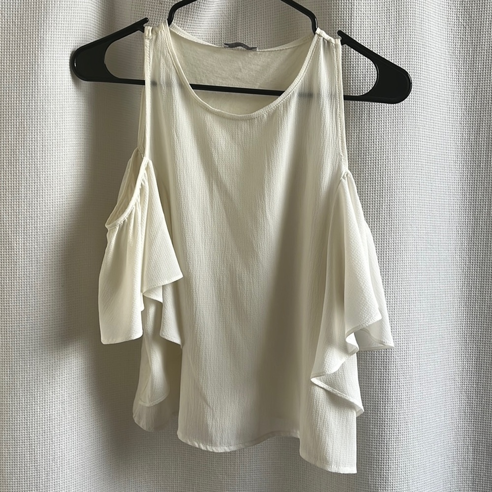 White blouse with cut out shoulders